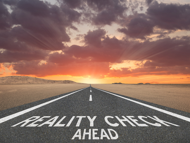 Reality check printed on roadway